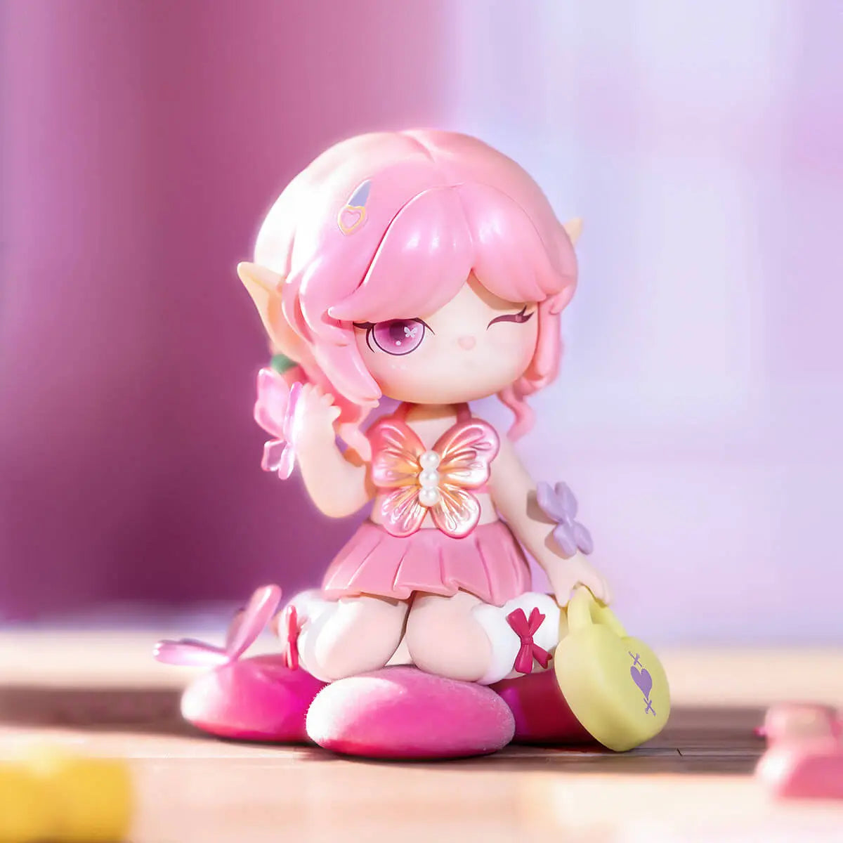 Close-up of pink Suri Colorful Girls collectible figure
