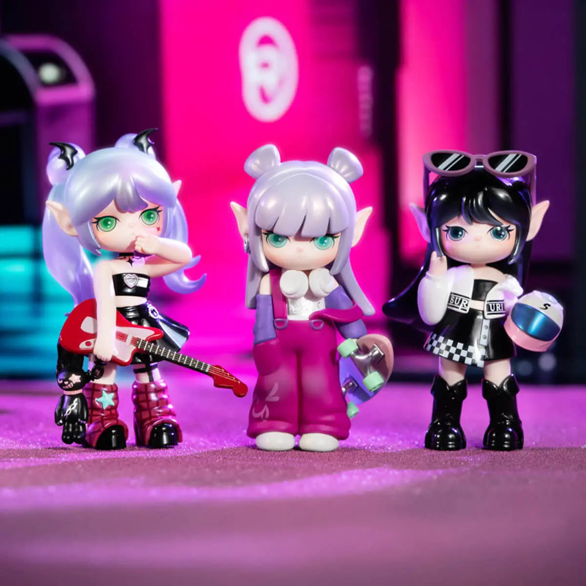 Suri Colorful Girls collectible figures in a colorful display scene