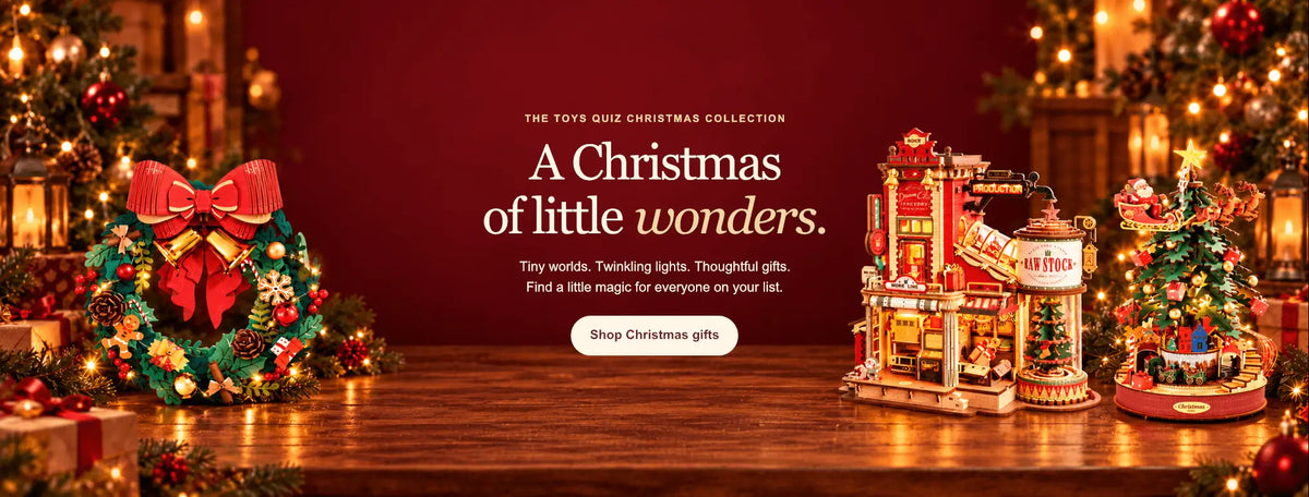 Toys Quiz Christmas Collection – A Christmas of Little Wonders featuring festive DIY wooden models, a Christmas wreath, miniature factory and Santa's sleigh.