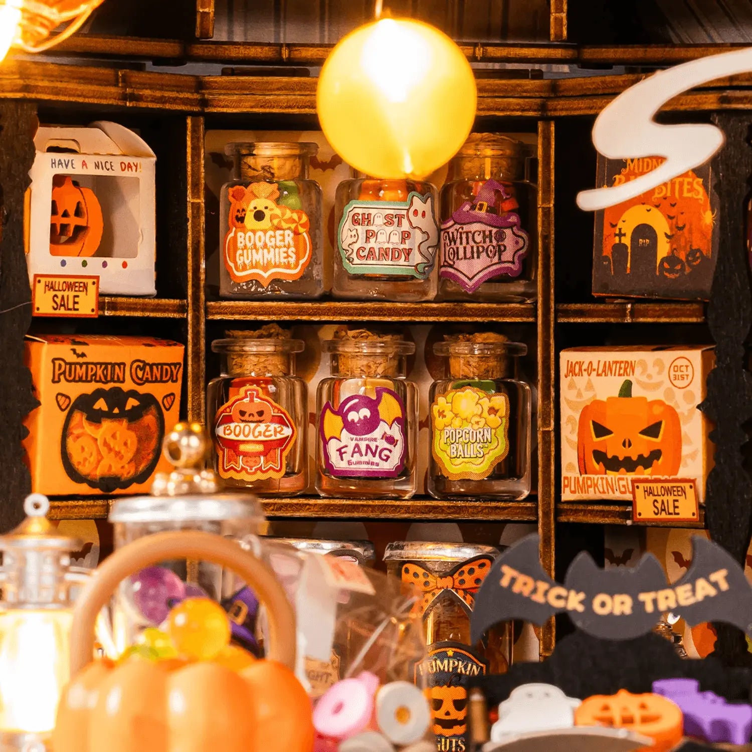 Rolife DG186 candy-shop shelves with jars and glowing details