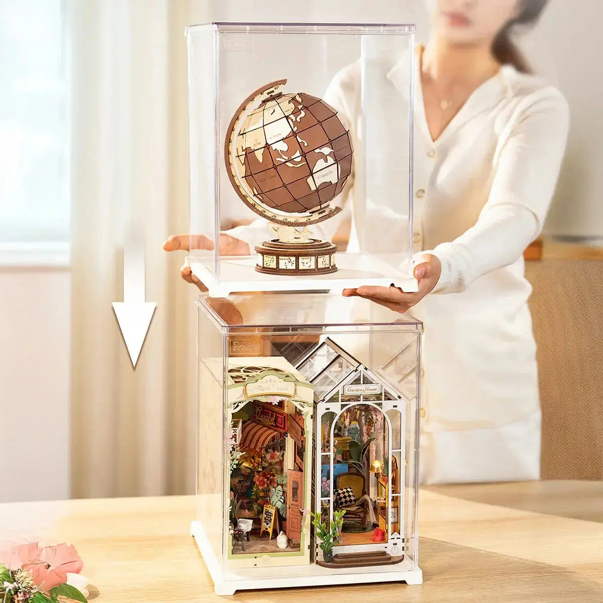 Stackable acrylic display case with globe and book nook models