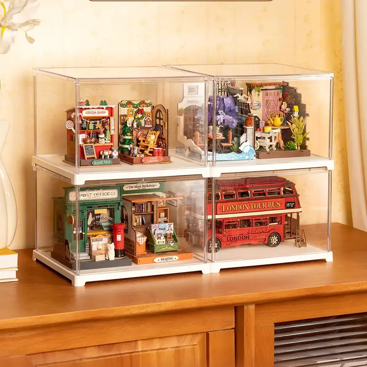 Small display case protecting a completed DIY miniature model