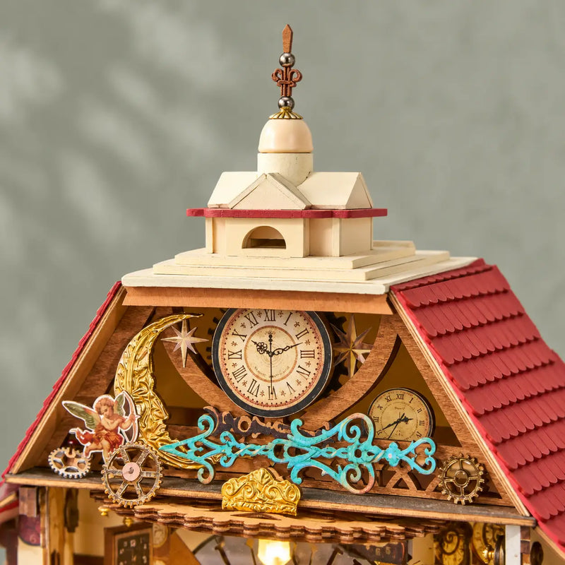 Angled view of the cream clock tower, red roof and turquoise scrollwork on the Rolife Clockwise Clocks DH104 miniature.