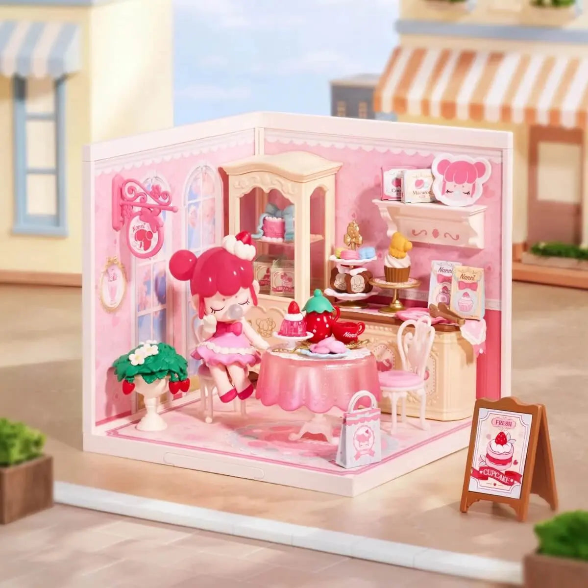 Rolife Nanci Strawberry Teatime DWL07 miniature tea room displayed in a pastel street scene