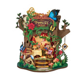 Rolife Forest Tea Party AMT03 DIY music box with a woodland tea scene, butterflies and a hanging pocket watch on a white background.