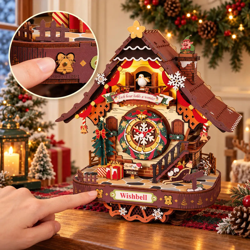 A finger using the ROKR LCB01 Christmas clock’s front control, with a circular inset showing the button beside the gold bell.