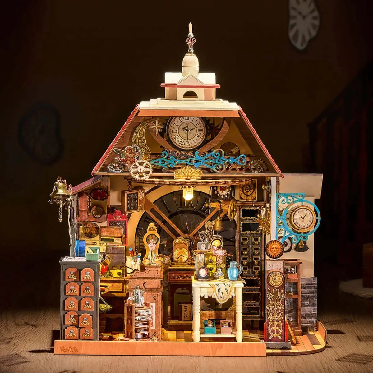 Front view of Rolife Clockwise Clocks DH104 with warm LED lighting, miniature clocks, a workbench and display cabinets.