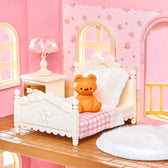 Fairy Rose Cottage bedroom with white bed, teddy bear, lamp and pink walls