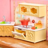 Fairy Rose Cottage kitchen with yellow cabinets, sink, stove and cookware