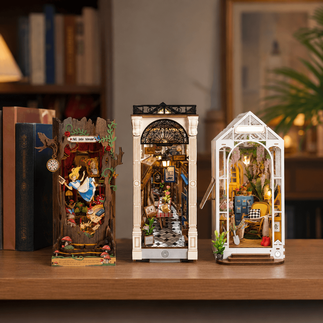 Illuminated DIY book nook displayed between books on a shelf