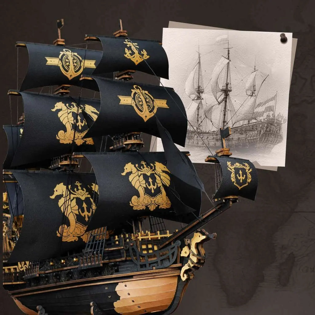 Close-up of The Seahorse Barque 3D Wooden Puzzle highlighting detailed black sails with golden seahorse