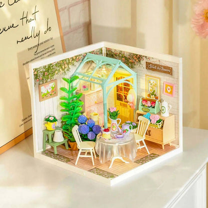 DIY Miniature House Kit featuring tiny furniture, tea accessories, and shelves - Toys Quiz