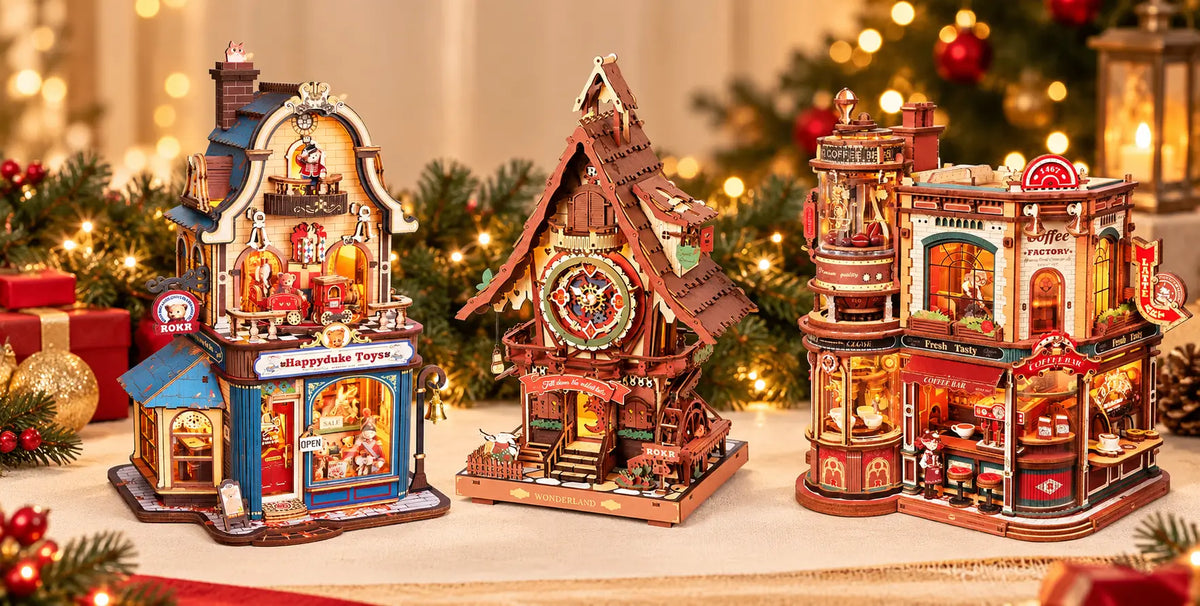 Happyduke toy shop, Wonderland clock and Coffee Factory wooden models displayed with Christmas lights and decorations.