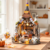 Haunted Candy House Halloween miniature displayed by a window