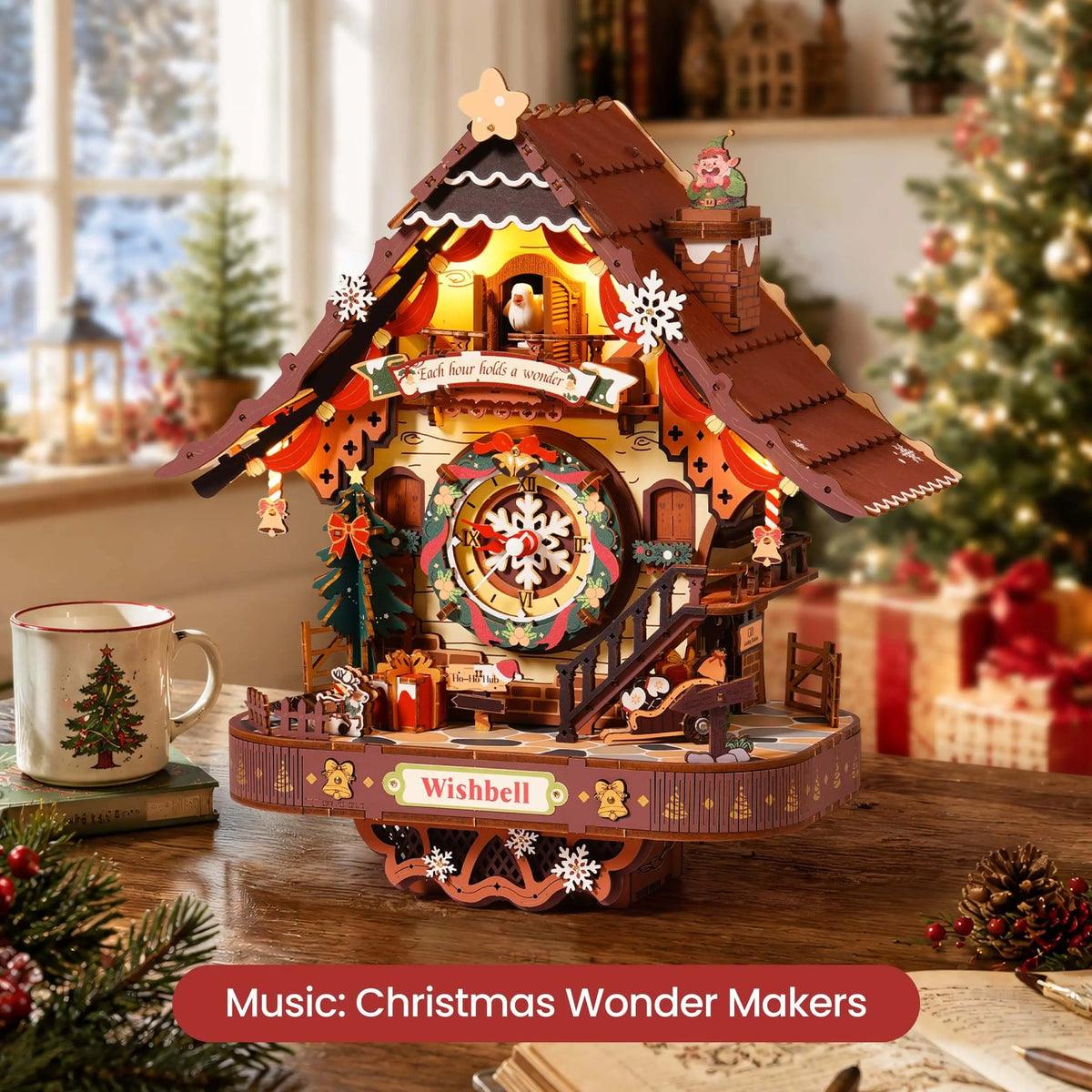 Illuminated ROKR LCB01 cuckoo clock on a tabletop with the caption “Music: Christmas Wonder Makers”.