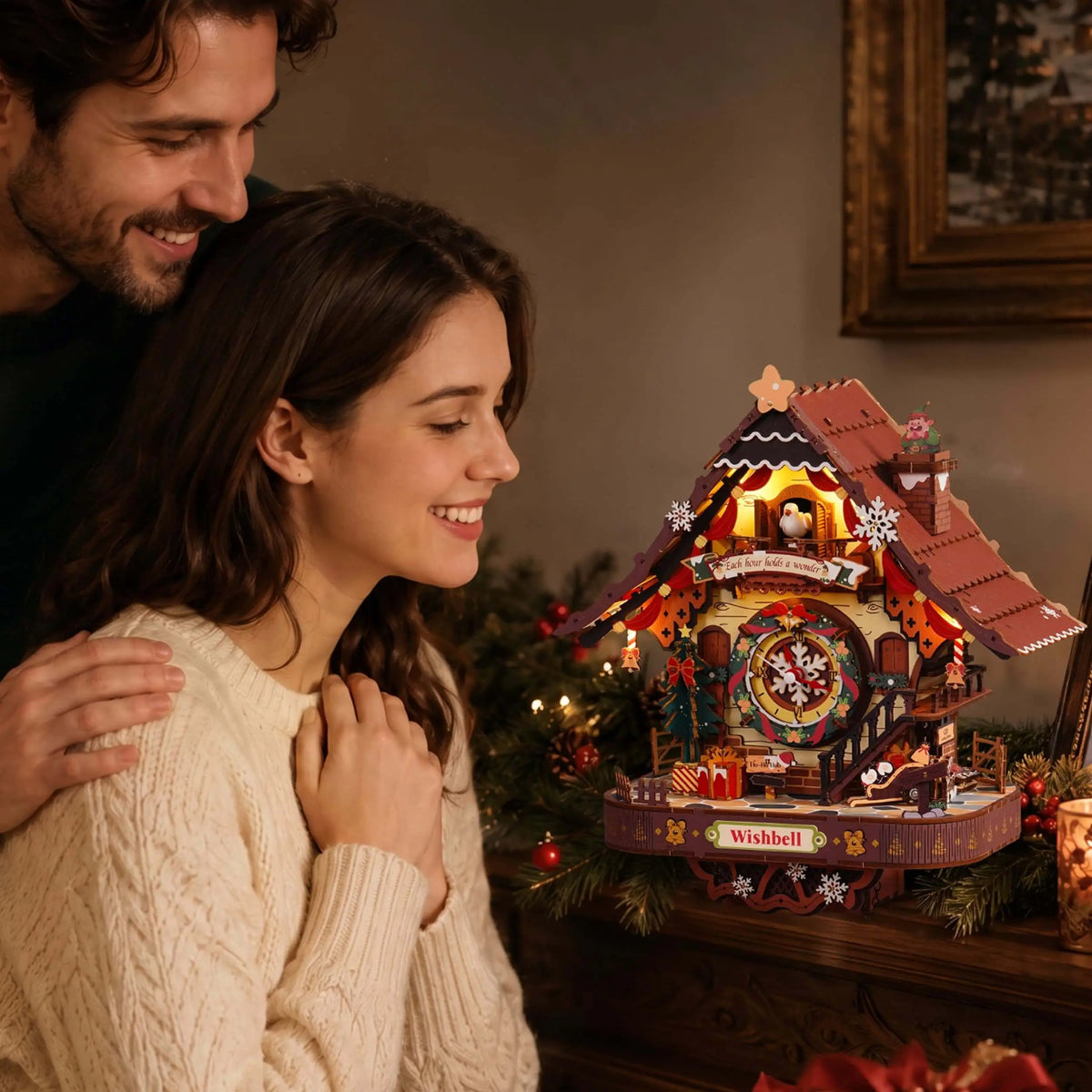 Couple admiring the illuminated ROKR LCB01 Christmas cuckoo clock displayed among festive decorations.