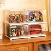 Small display case protecting a completed DIY miniature model