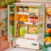 Close-up of the opening refrigerator and miniature fruit packages in Rolife DWS01B