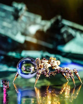 Finished Jumping Spider metal puzzle displayed with glowing reflections