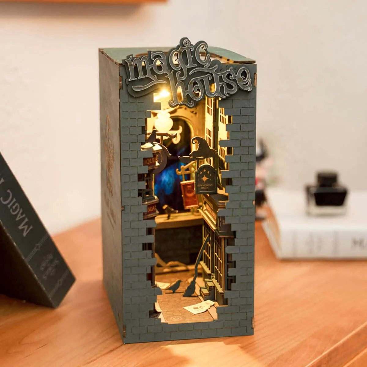 DIY Book Nook featuring a glowing spellbinding scene - Toys Quiz