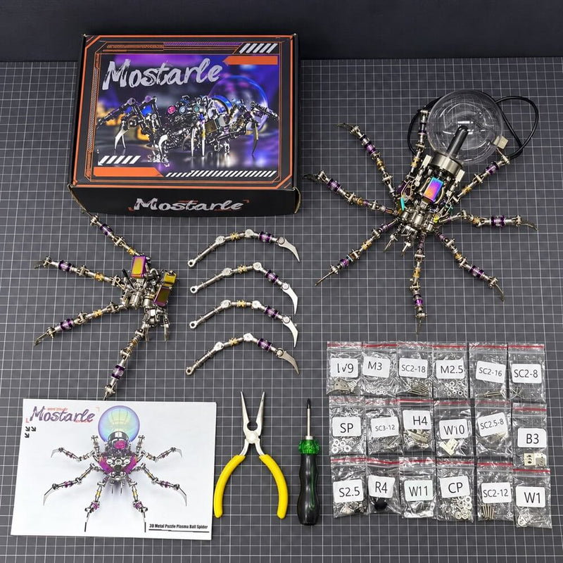 Mostarle Plasma Ball Spider kit with parts bags, guide, screwdriver and yellow needle-nose pliers on a cutting mat.