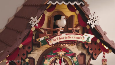 ROKR LCB01 Christmas cuckoo clock with a moving cuckoo bird in its illuminated window and Santa’s sleigh travelling around the cottage.