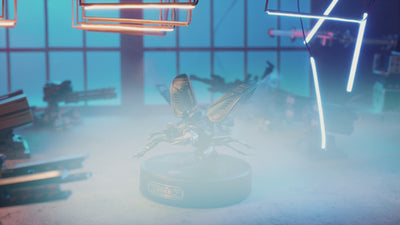 ROKR Storm Beetle MI03 with raised wings on its display base in a blue-lit workshop
