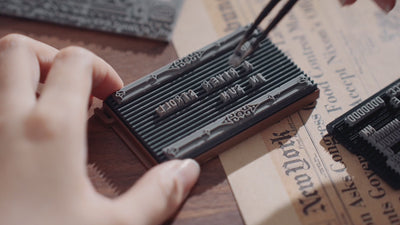 Customizable letterpress plate with interchangeable rubber characters
