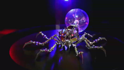Mostarle Plasma Ball Spider metal model rotating on a display stand, followed by a close-up of its glowing purple plasma ball.