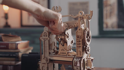 ROKR Classic Printing Press operating with illuminated workshop