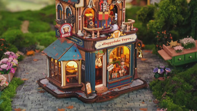 ROKR Happyduke Toys EAM01 displayed in a village scene with panoramic windows and warm lighting